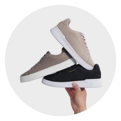 Svarta mockasko med vit sula för herr