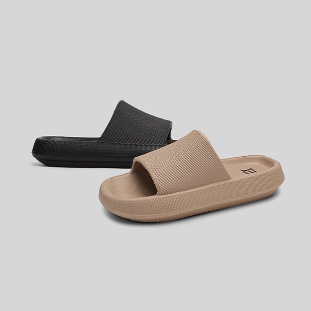 Slip in tofflor i beige och svart